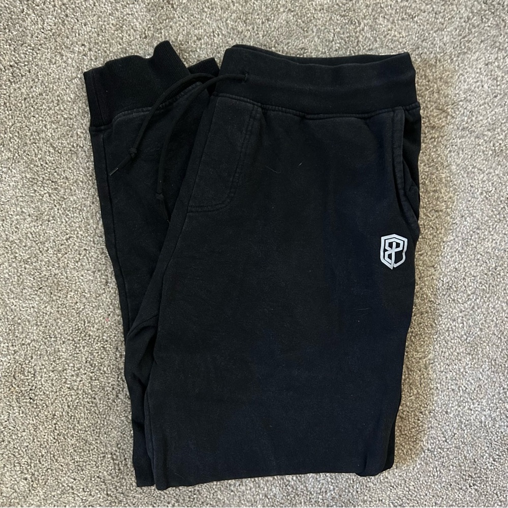 Born Primitive women’s Unmatched black joggers / sweatpants - size large